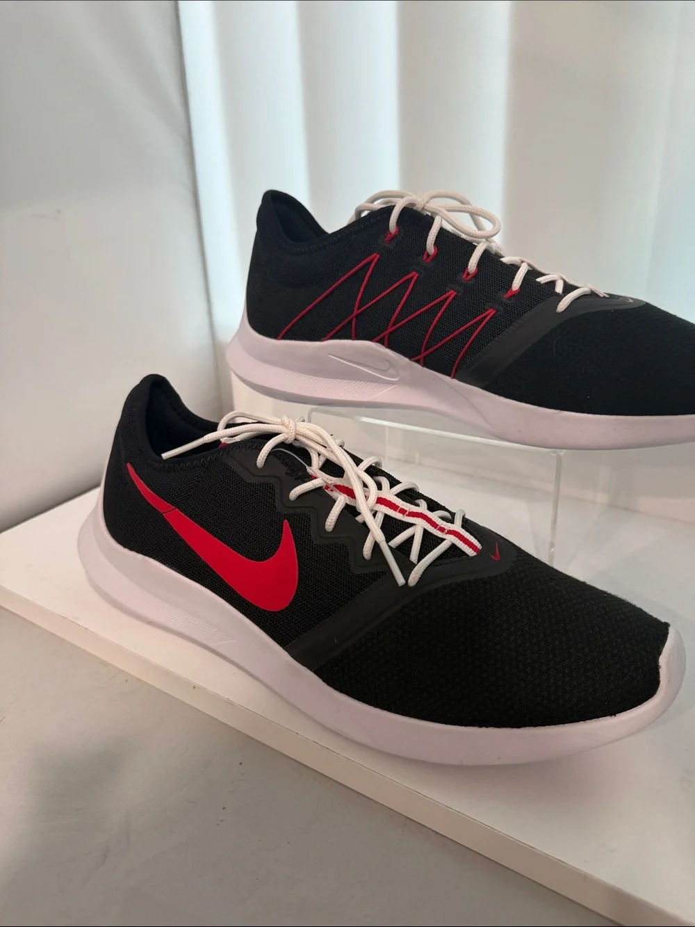 Nike Men's Black Athletic Shoes with Red Swoosh and White Sole